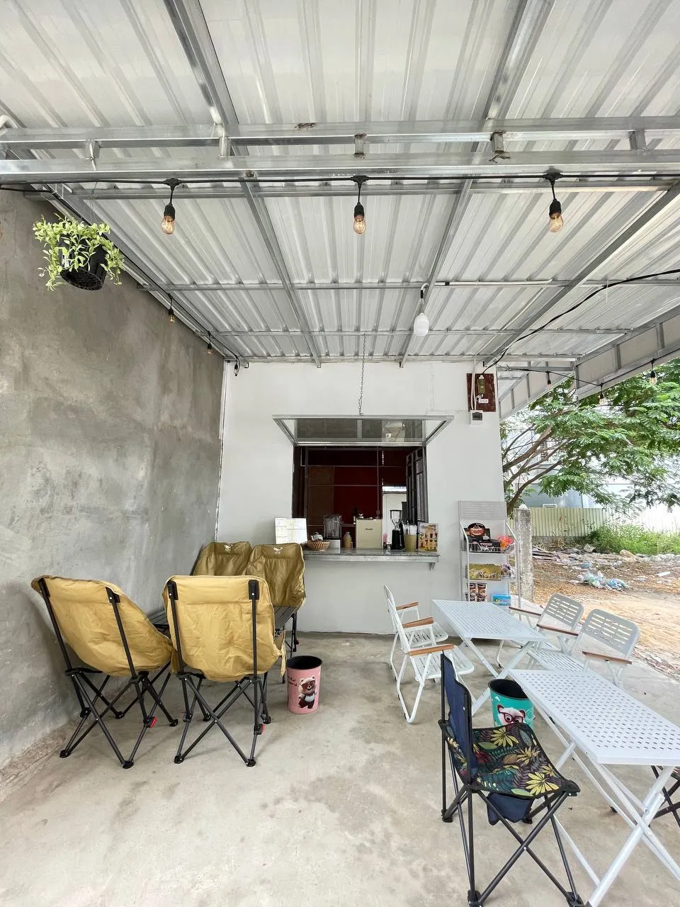 Interior of Flow Cafe in Poipet — cozy seating and warm ambiance